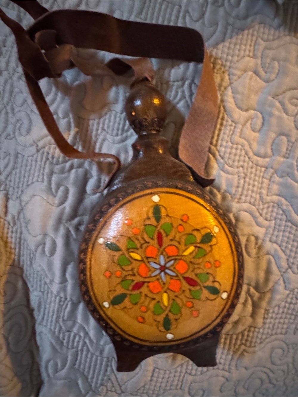 Vintage Brown Leather Flask with Yellow Floral Medallion